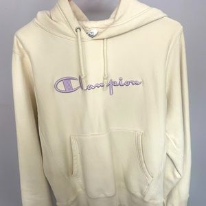 Size small urban outfitters Champion cream colored hoodie with purple branding